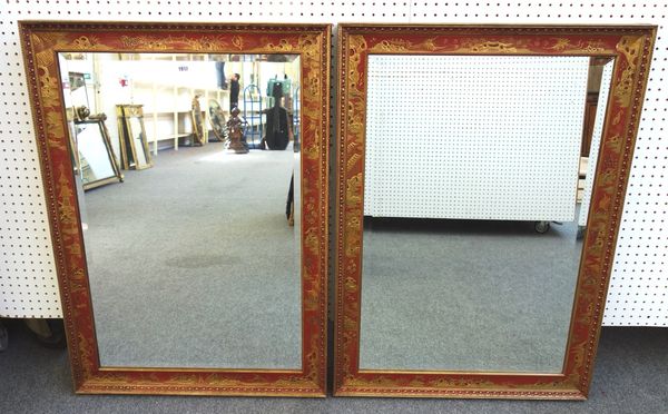 A pair of 20th century red lacquer chinoiserie decorated rectangular wall mirrors with bevelled mirror plate, 75cm x 107cm, (2).