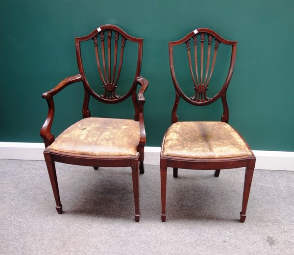 A set of eight George III design shield back dining chairs, with bow sets on tapering square supports, to include a pair of carvers, (8).