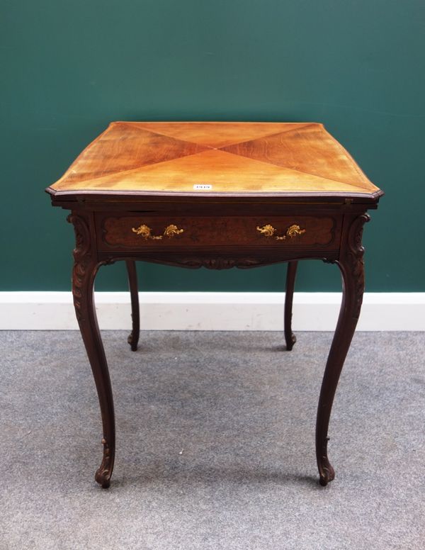 A late 19th century marquetry inlaid envelope card table, with single frieze drawer, on cabriole supports, 60cm wide.