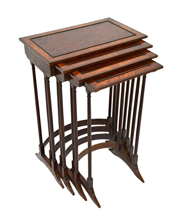 A nest of four 19th century satinwood and Kingwood banded figured yew occasional tables, on turned supports, united by concave stretcher, the larger 5