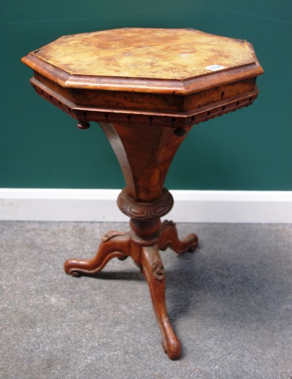 A Victorian figured walnut trumpet shaped work table, on a tripod base, 49cm wide.