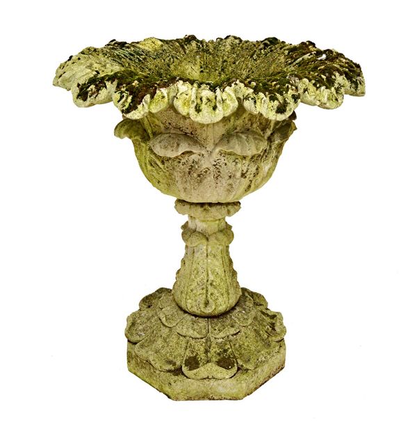 Austin Seeley, a late 19th century stone effect garden planter with naturalistic flared rim and leaf moulded body and column on flared octagonal base,