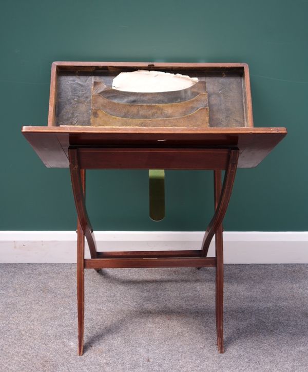 An Edwardian boxwood strung mahogany folding travelling writing desk by Leuchars & Son, 61cm wide.