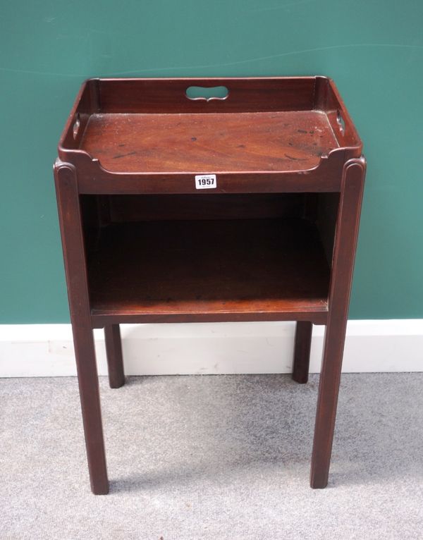 A George III mahogany nightstand, the galleried rectangular top above open cupboard, on canted square supports, 46cm wide.