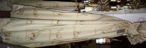 A pair of 20th century animal print cream cotton lined curtains, 20 inches x 70 inches drop, together with a single 40 inch x 87 inch drop.