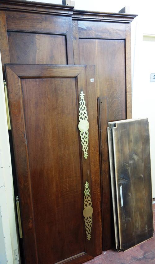 A 19th century French oak and chestnut armoire, with a pair of panel doors on block feet, 170cm wide x 223cm high.