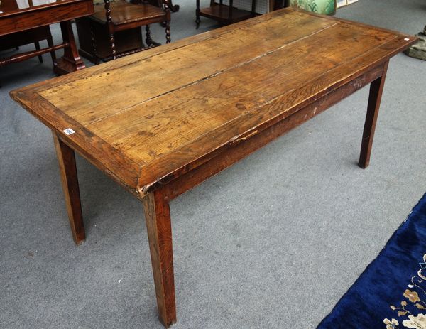 An 18th century contental oak kitchen table, with three frieze drawers on tapering square supports, 74cm wide x 64cm deep.