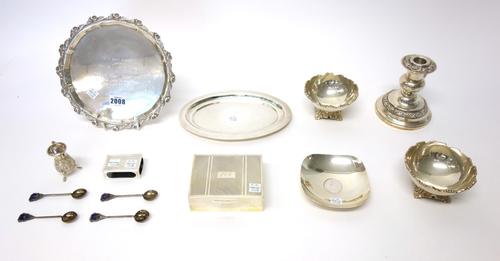 Indian and Eastern wares, comprising; a shaped circular salver, decorated with a floral border, the centre presentation inscribed, a pair of shaped ci