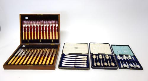 A set of six silver teaspoons, Sheffield 1926, cased, a set of six silver Old English pattern teaspoons, Sheffield 1918, cased, combined weight 180 gm