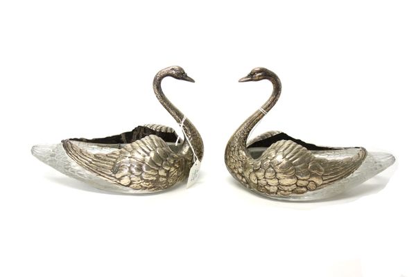 A pair of Sterling silver mounted moulded glass pot pourri dishes, each modelled as a swan, detailed Sterling.