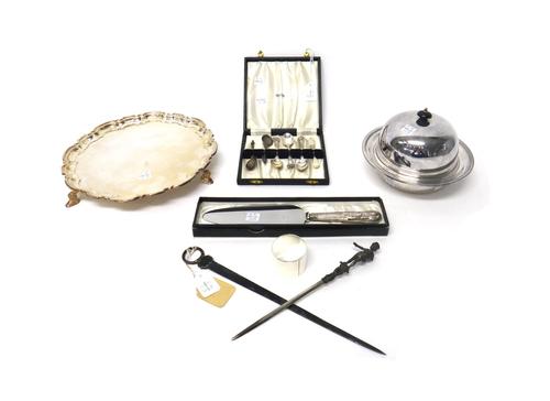 Silver and silver mounted wares, comprising; a skewer with a loop and shell handle, circa 1760, a napkin ring, Birmingham 1938, three King's pattern c
