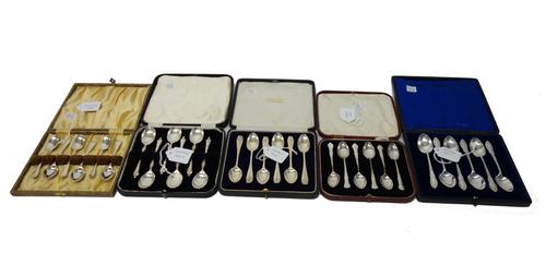 Five sets of six silver tea and coffee spoons, comprising; Sheffield 1900, Sheffield 1888, Sheffield 1948, London 1923 and London 1926, with five case