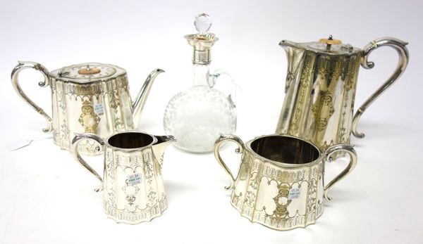 A silver plated, metal mounted glass claret jug, with floral etched decoration and a Victorian silver plated four piece tea set, comprising; a teapot,