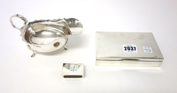 Silver and silver mounted wares, comprising; a rectangular table cigarette box, wooden lined within, London 1923, a rectangular matchbox slide and a s