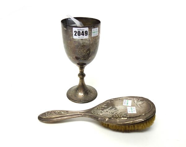 Silver and silver mounted wares, comprising; a Victorian trophy goblet, engraved with fern sprays and raised on a trumpet shaped foot, London 1883, a