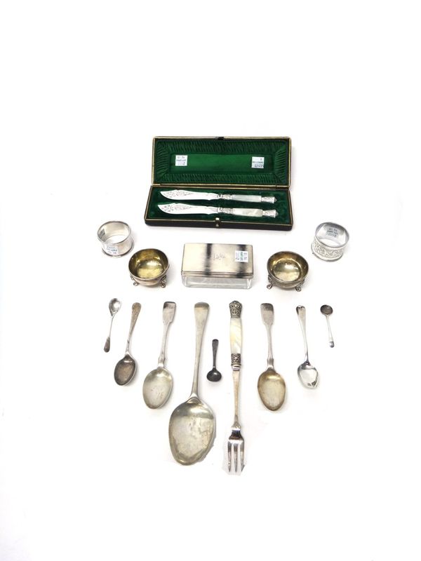 Silver and silver mounted wares, comprising; a pair of Victorian circular salts, two napkin rings, a rectangular glass toilet box, with a silver lid,