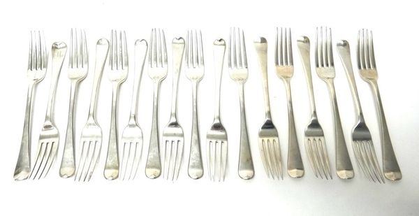 Ten George III silver Old English pattern table forks, crest engraved, London 1815 and seven George III silver Old English pattern table forks, London