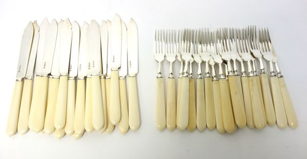 A set of eighteen pairs of silver fish knives and forks, having ivory handles, all are London 1950, with a copy of a Certificate for commercial activi