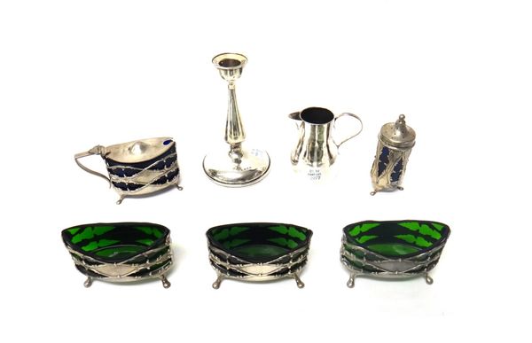 Silver and silver mounted wares, comprising; three boat shaped salts, having green glass liners, a mustard pot and a pepperette, with associated blue