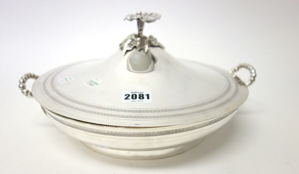 A European twin handled serving dish, with a detachable cover, the base having cast handles and with a decorated rim, detailed 900, the detachable cov