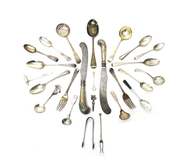 Mostly silver table flatware, comprising; an Old English pattern sauce ladle, London 1796, a sugar sifting spoon, London 1791, two steel bladed table