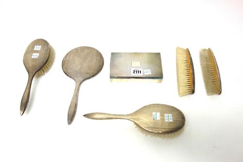 Silver and silver mounted wares, comprising; a rectangular hinge lidded table cigarette box, the cover with cross hatched decoration, wooden lined wit