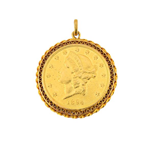 A U.S.A. gold twenty dollars 1894, in a gold pendant mount, decorated with a pierced border, gross weight of pendant 38.2 gms. Illustrated