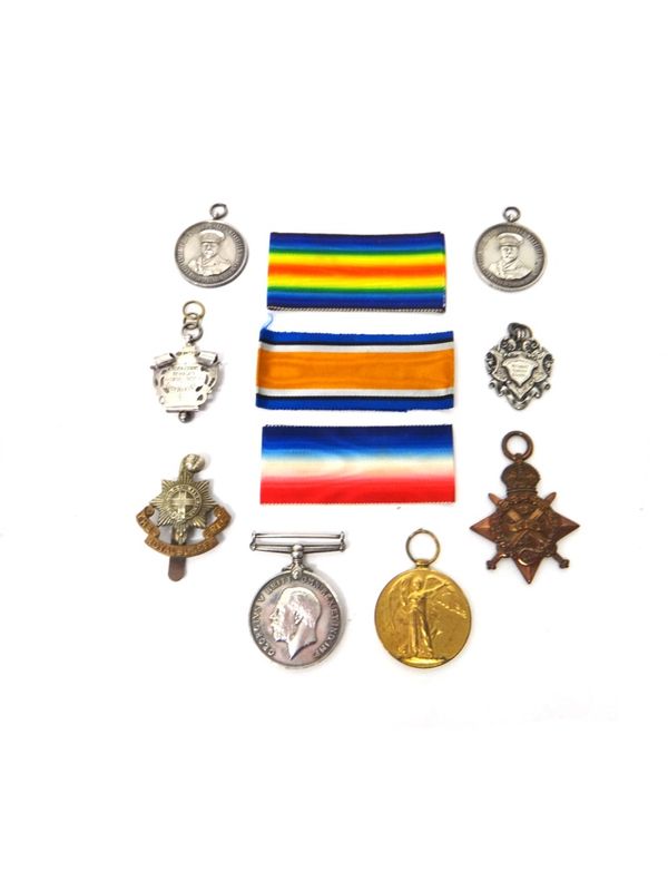 The 1914 Star to 14096 GNR;L.E.HARVEY. R.F.A., The 1914-18 British War Medal and The 1914-19 Victory Medal to RFRA-14096 GNR.L.E.HARVEY. R.A., with ri