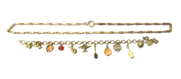 A gold neckchain, in an oval and bar link design, on a boltring clasp, weight 14.4.gms and a gold ropetwist circular and oval link charm bracelet, fit