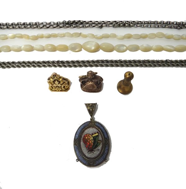 A 9ct gold pendant fob seal, with scroll and foliate pierced decoration, London 1919, a cornelian set pendant fob seal, another seal, an oval micro-mo