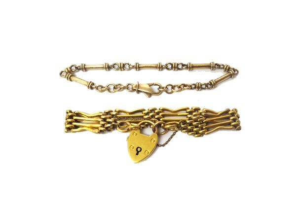 A 9ct gold bracelet, in a baton and circular link design, on a sprung hook shaped clasp, weight 17.1 gms and a gold bar and oval link gate bracelet, o