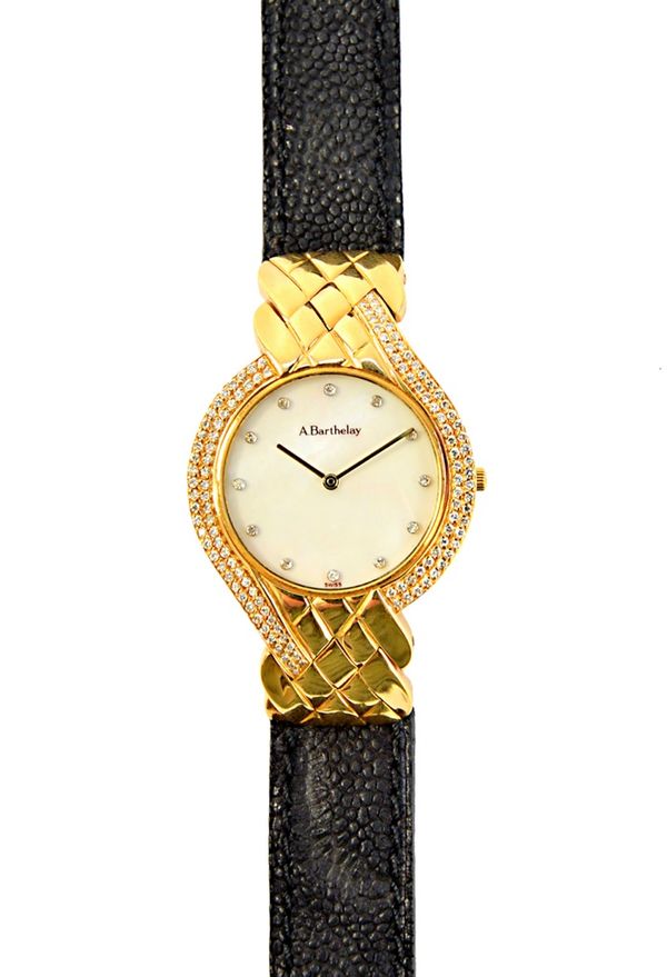 A gold, diamond set and mother of pearl dress wristwatch by Alexis Barthelay, the signed circular mother of pearl dial having diamond set numerals and