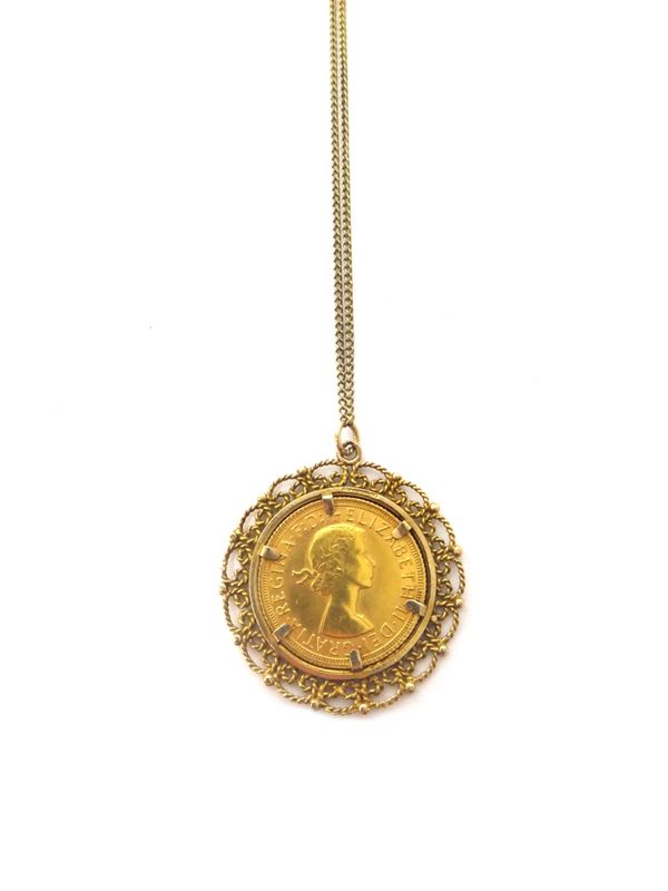 An Elizabeth II sovereign, 1968, in a gold pendant mount, with a curb link neckchain, on a boltring clasp, combined weight 13.4 gms.