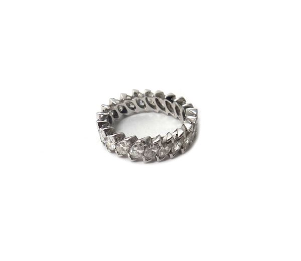 A diamond set full eternity ring, mounted with twenty-one marquise shaped diamonds, in a slanting design, total weight approx 3.00 cts, weight of ring