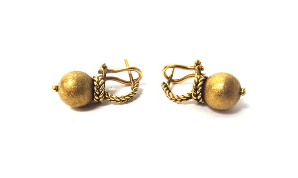 A pair of gold earrings, each with a textured bead, having a herringbone linkage surmount, with post and butterfly clip fittings, detailed 750, combin