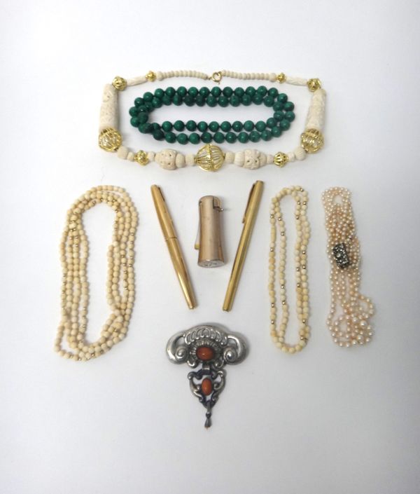 A three row necklace of graduated cultured pearls, on a colourless paste set rectangular clasp, a single row necklace of malachite beads, three furthe