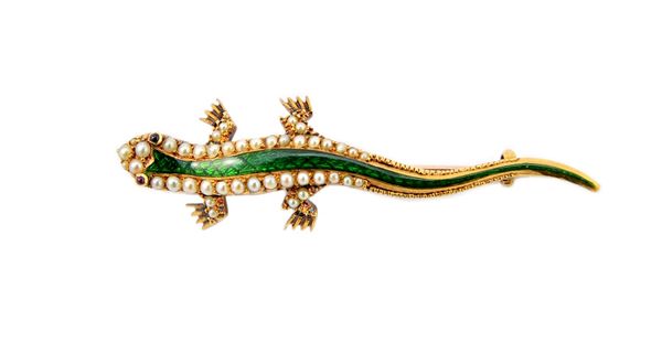 A gold, seed pearl set and green enamelled brooch, designed as a lizard, having cabochon ruby set eyes, detailed 15, gross weight 7 gms. Illustrated