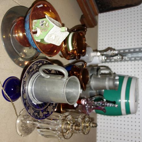 A group of ceramics and collectables including copper lustre jugs, glass bells, pewter tankards, glass lustre candlesticks and sundry.