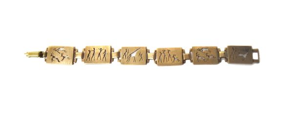 A gold bracelet, formed as a row of six rectangular panels, pierced with animals and figures, with a folding clasp, detailed 9 CT, length 17cm and wei