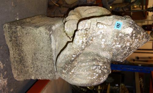 A 20th century stone figure of a man and a square base (2).