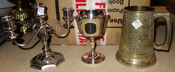 A quantity of assorted silver plate, candelabra, coffee pots and vases.
