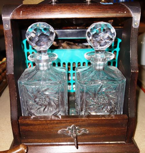 A 20th century mahogany twin division tantalus and a group of assorted ceramics and collectables.