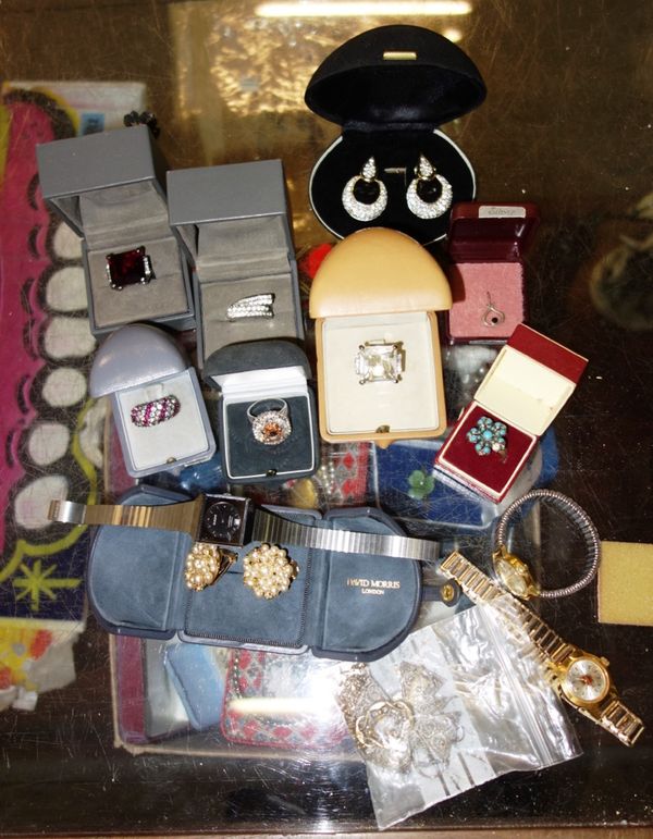A quantity of assorted costume jewellery and watches.