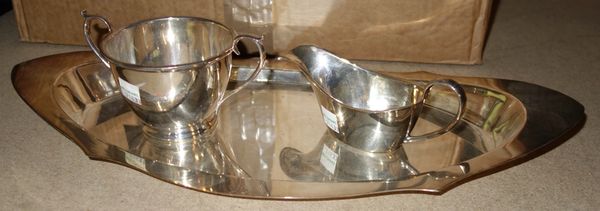 A quantity of assorted silver plate including silver tureens, a cruet set and sundry.