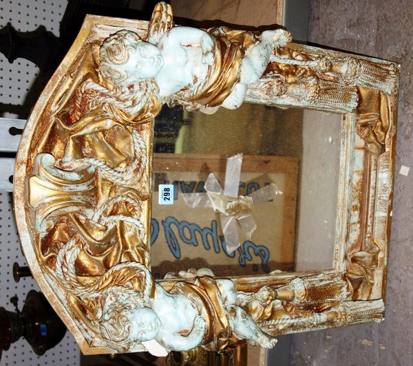 A blue and gilt decorated plaster wall mirror, moulded with cherubs.