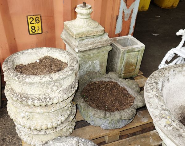 A group of four 20th century reconstituted stone circular planters.