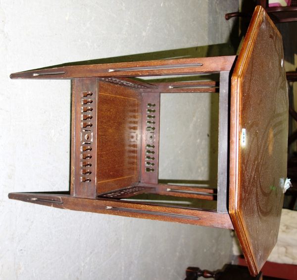 An Edwardian mahogany and satinwood banded octagonal occasional table.