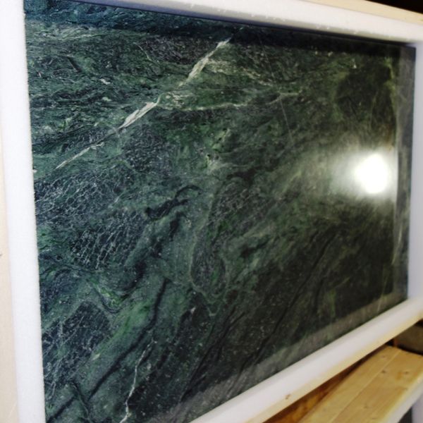 A pair of green rectangular marble tops. (2)