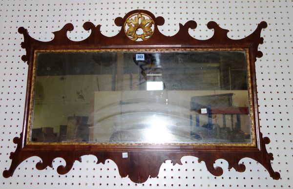 A 19th century mahogany fret cut rectangular wall mirror with gilt surmount.