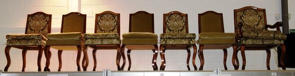 A set of ten 20th century walnut framed dining chairs with upholstered backs and seats. (10)